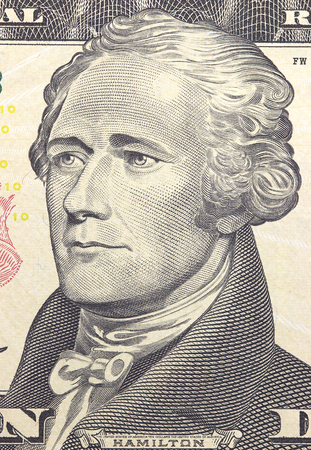 Alexander Hamilton face on US ten or 10 dollars bill macro, united states money closeupの写真素材