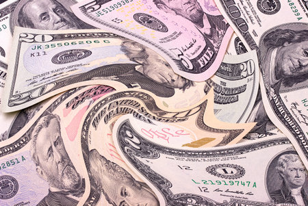 Abstract dollar bills of different denominations background