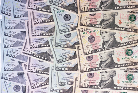 abstract money background us dollars of different denominations