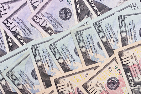 abstract money background us dollars of different denominations