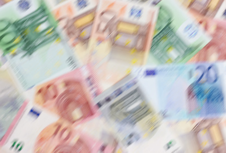 Euro money of different denominations blured backgroundの写真素材