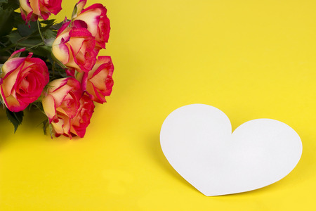 Valentines day greeting card roses yellow background white heartの写真素材