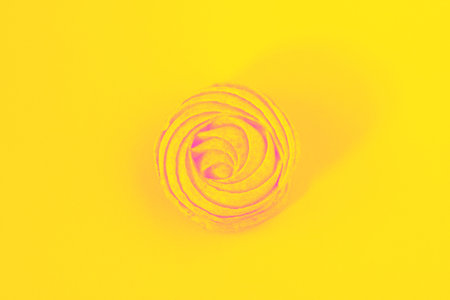 Yellow cake or marshmellow on yellow background