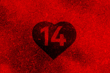 Digit 14 painted in white heart on a pavementの写真素材