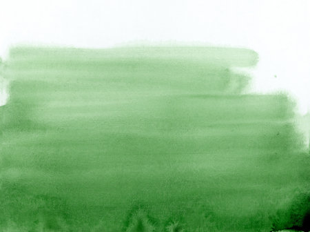 Bright painted green watercolor texture. Hand drawn backgroundの写真素材