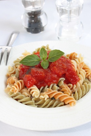 Fusilli pasta with tomato sauceの写真素材