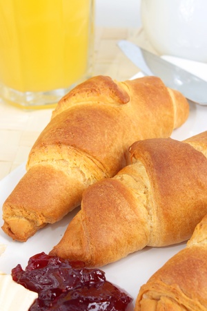 Fresh croissants, orange juice and coffeeの写真素材