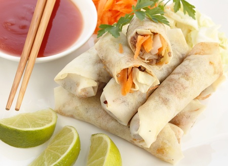 close-up of spring rolls with sweet and sour sauce の写真素材