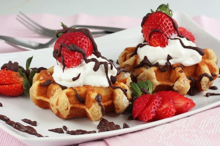 Strawberry waffles with creamの写真素材