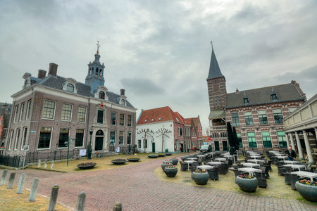 EDAM, NETHERLANDS - MARCH 3, 2019: Old Town Hall Edam in the town square. The municipality of...