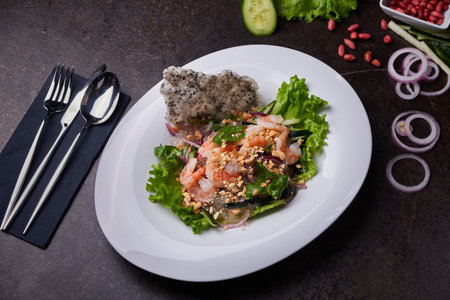 Shrimp bowl. Pan-asian dish top view on a dark tableの写真素材