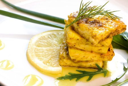 pices of fry cheese on the white plateの写真素材