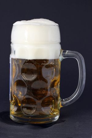  Free beer mug with foamの写真素材