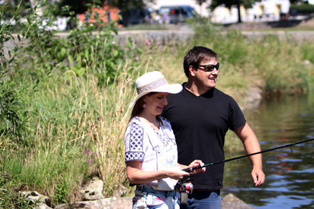 Woman and man by sportfishingの写真素材