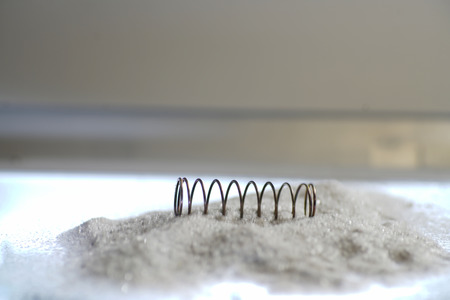 Sand is a naturally occurring sediment, which is composed of mineral grains with a small grain size.の写真素材