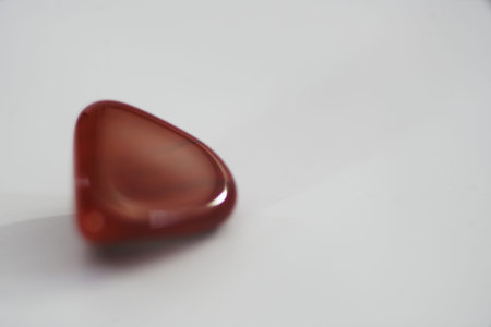 Single gemstones in front of a light background in closeupの写真素材