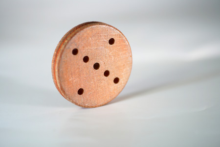 Timber made of wood belongs to an old toy for children techniqueの写真素材