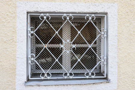 Latticed windows protect against burglarsの写真素材