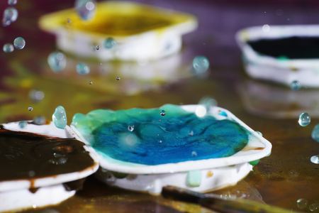 Watercolors with water drops as background picturesの写真素材