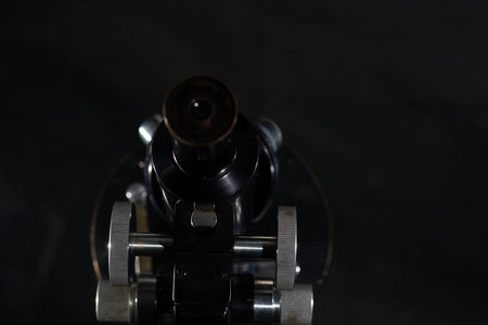 This is an old microscope in good condition and working