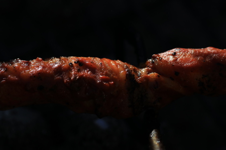 Sausages barbecue with a charcoal barbecue in the gardenの写真素材