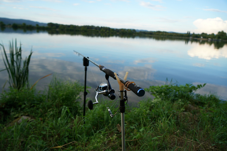 Fishing in Germany on a warm summer evening on the Danubeの写真素材