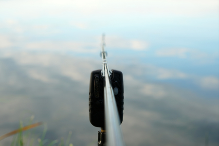 Fishing in Germany on a warm summer evening on the Danubeの写真素材