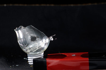 Broken glass photographed in front of black background