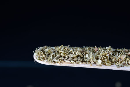 Spices for the kitchen spices in best studio quality photographed partly isolated against black...