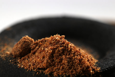 Spices for the kitchen spices in best studio quality photographed partly isolated against black...