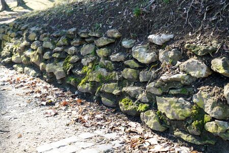 With natural stones in the garden or park artfully brickedの写真素材