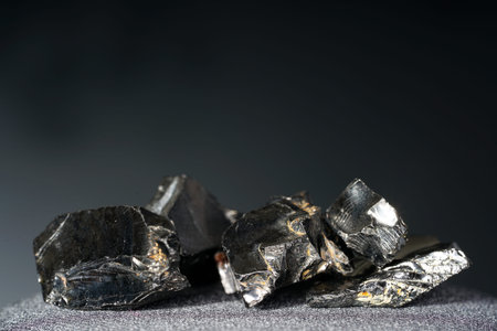 Shungit is a black rock that consists mainly of carbon and was photographed in top quality and...