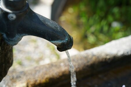 Water drops photographed with higspeed flashes and dropper in the studioの写真素材