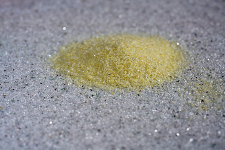 Sand photographed in the studio with color foils before the flash