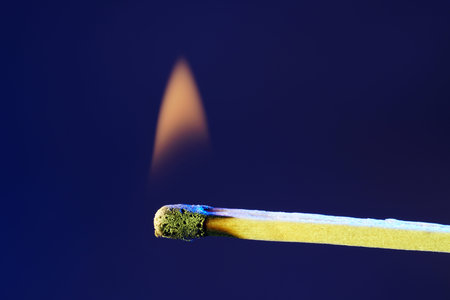 Lit matches and blown out in the studio photographed with colorful foils before the flashes
