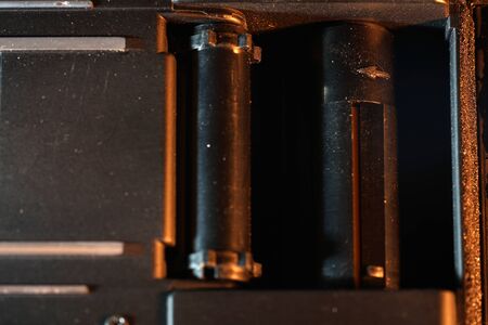 Film transport photographed on an old photo camera in the studio with flash lightの写真素材
