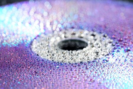 Water drops with high-speed flashes and automatic drip photographed in the studioの写真素材