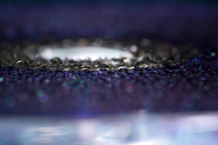 Water drops with high-speed flashes and automatic drip photographed in the studio