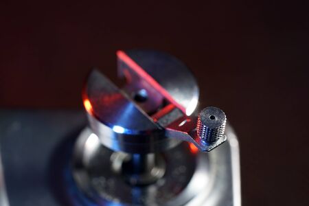 Small crank for film transport photographed on an old camera in the studioの写真素材