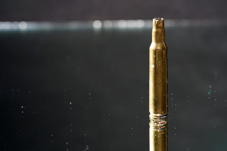 Ammunition for toy guns photographed on mirror in studio