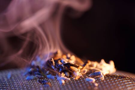 After lighting, thyme spreads a pleasant fragrance and is therefore very suitable for smoking meat and fish, photographed in the studioの写真素材