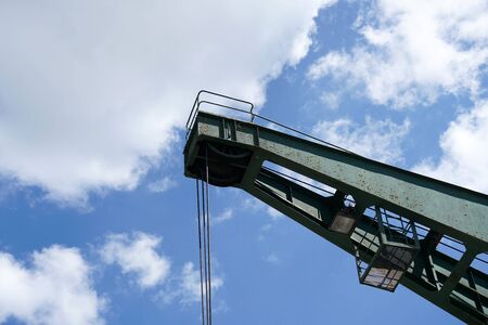 Crane in an industrial port on the Danube in Bavaria photographed in springの写真素材