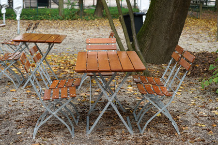 Benches and chairs at tables invite you to relax and unwind