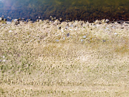 A brook river stream in Bavaria, aerial view photographed with a drone in winterの写真素材