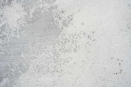 Moldy stone wall through damp walls structure photographed in daylightの写真素材