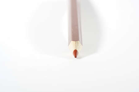 Colorful crayons, pencils with plain paper as a background with structureの写真素材