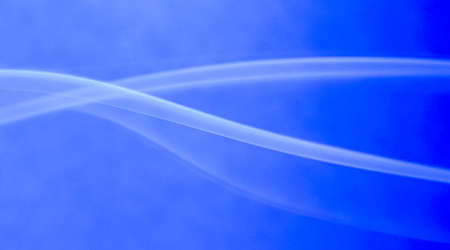 Smoke from an incense stick with color foils Photographed in the studioの写真素材