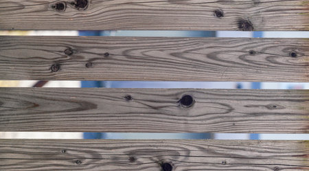 Wood with a fine rustic structure as a background, photographed in daylight