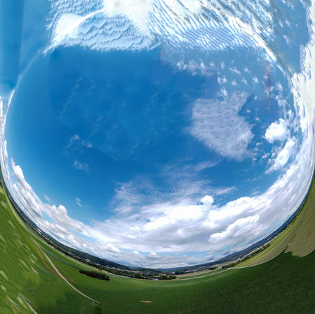 Abstract panoramic aerial view in a forest and field with fantastic beautiful clouds and curvature...