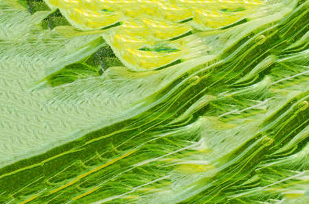 Glass background image mixed with colorful paint, creative editedの写真素材